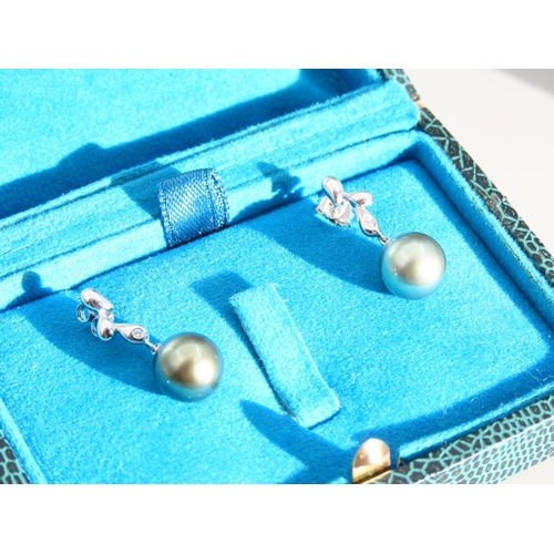 409 - Pair of Pearl Set and Diamond Decorated 9 Carat White Gold Drop Earrings Each 2cm High