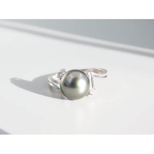 410 - 9 Carat White Gold Pearl and Diamond Set Ladies Ring Size O