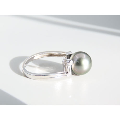 410 - 9 Carat White Gold Pearl and Diamond Set Ladies Ring Size O