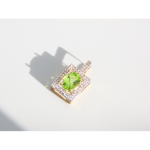 411 - Peridot and Diamond Set 9 Carat Gold Pendant 2cm High