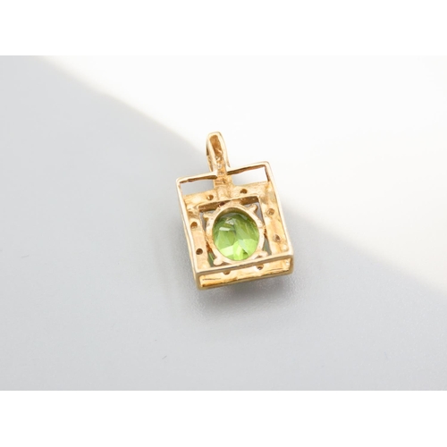 411 - Peridot and Diamond Set 9 Carat Gold Pendant 2cm High