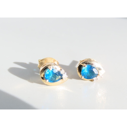 414 - Pair of Blue Topaz and Diamond Set Ladies Earrings Mounted in 9 Carat Yellow Gold