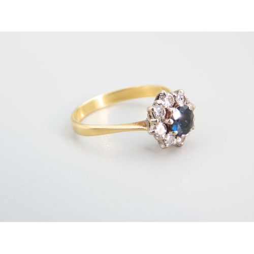 435 - Sapphire and Diamond Ladies Cluster Ring Mounted on 9 Carat Gold Band Size P