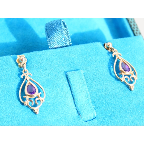 439 - Pair of Amethyst Set Ladies 9 Carat Yellow Gold Earrings Each 2cm High