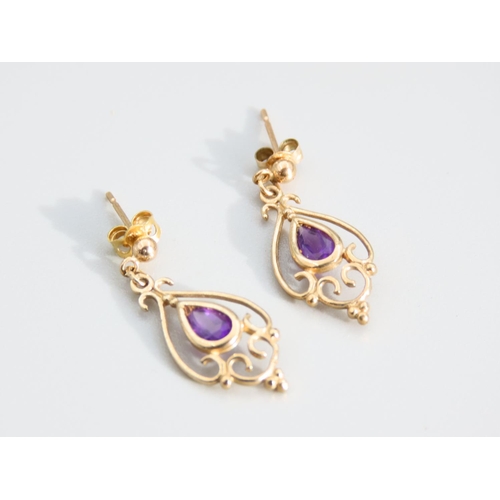 439 - Pair of Amethyst Set Ladies 9 Carat Yellow Gold Earrings Each 2cm High