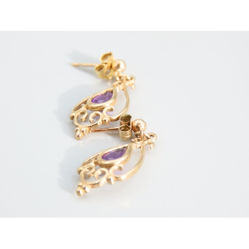 439 - Pair of Amethyst Set Ladies 9 Carat Yellow Gold Earrings Each 2cm High