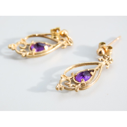 439 - Pair of Amethyst Set Ladies 9 Carat Yellow Gold Earrings Each 2cm High