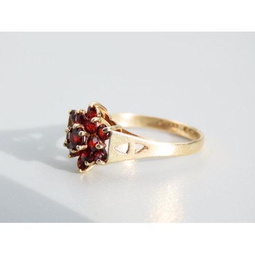 442 - Garnet Cluster Ring Mounted on 9 Carat Yellow Gold Band Ring Size O