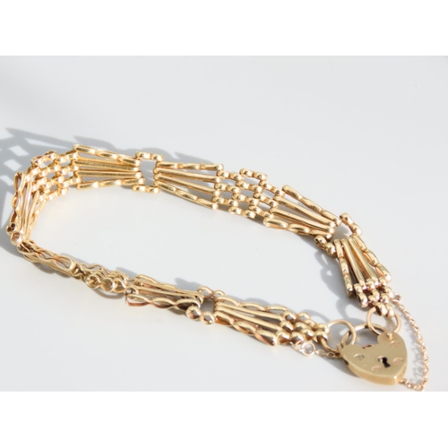 448 - 9 Carat Yellow Gold Ladies Bracelet Articulated Form with Heart Motif Padlock Clasp 19cm Long