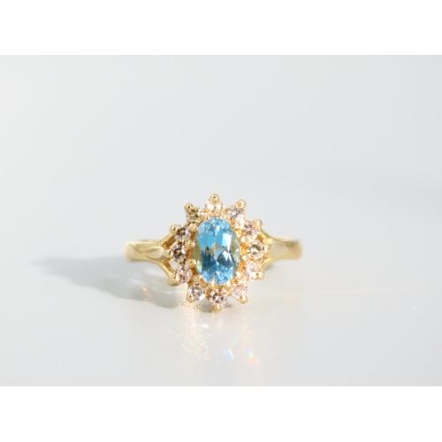 477 - Blue Topaz and Diamond Cluster Ring Mounted on 18 Carat Yellow Gold Band Ring Size K