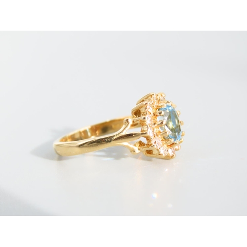 477 - Blue Topaz and Diamond Cluster Ring Mounted on 18 Carat Yellow Gold Band Ring Size K