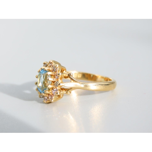 477 - Blue Topaz and Diamond Cluster Ring Mounted on 18 Carat Yellow Gold Band Ring Size K