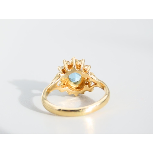 477 - Blue Topaz and Diamond Cluster Ring Mounted on 18 Carat Yellow Gold Band Ring Size K