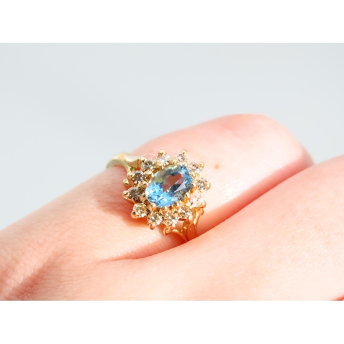 477 - Blue Topaz and Diamond Cluster Ring Mounted on 18 Carat Yellow Gold Band Ring Size K