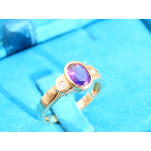 478 - Oval Cut Amethyst Set Centre Stone Ring with Diamond Set Shoulders Mounted on 9 Carat Yellow Gold Ba... 