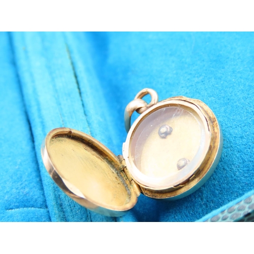 70 - 18 Carat Rose Gold Locket Circular Form Hinged Cover with Shield Motif Cover Decoration 1.5cm Diamet... 