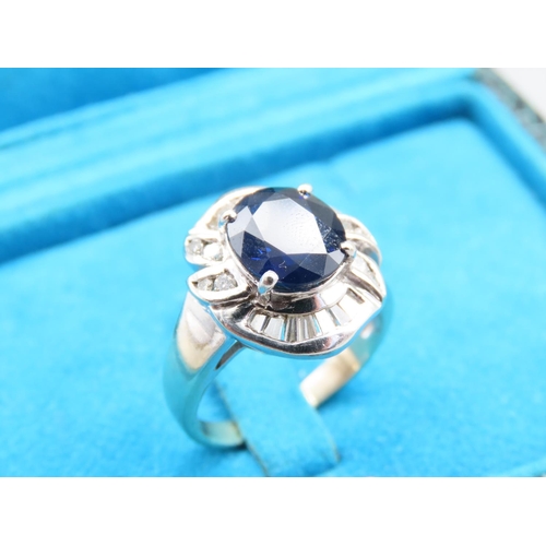 75 - Sapphire and Diamond Ladies Cluster Ring Diamonds Baguette Cut Sapphire of Attractive Hue Mounted on... 