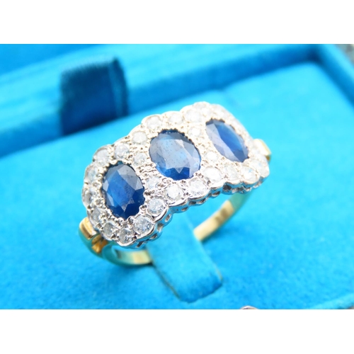 82 - Sapphire and Diamond Three Stone 18 Carat Yellow Gold Ring Platinum Set Ladies