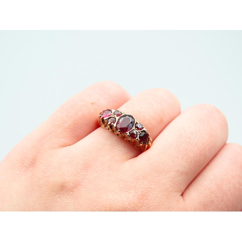 88 - Garnet Set Ladies 9 Carat Yellow Gold Ring Size Q and a Half