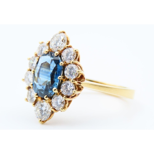 1034 - Vintage French Circa 1950 18 Carat Yellow Gold Oval Sapphire and Diamond Cluster Ring Sapphire 2.14 ... 