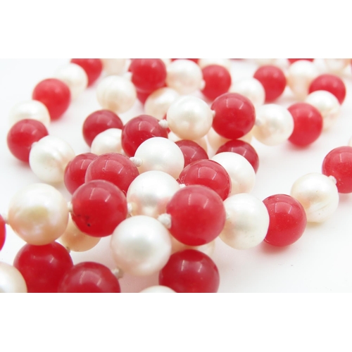 1074 - Two Pearl Necklaces One Single Strand and Another Polished Gemset and Pearl Each 120cm Long