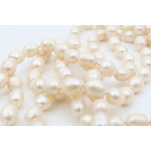 1074 - Two Pearl Necklaces One Single Strand and Another Polished Gemset and Pearl Each 120cm Long