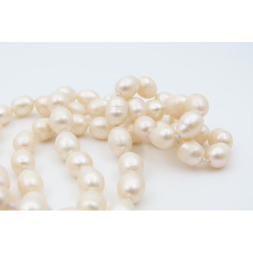 1074 - Two Pearl Necklaces One Single Strand and Another Polished Gemset and Pearl Each 120cm Long