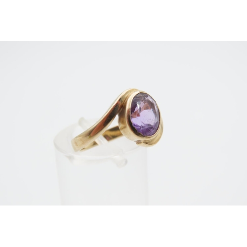 1082 - Amethyst Center Stone Ring Mounted on 9 Carat Golds Band