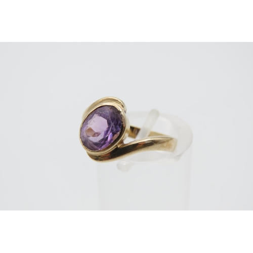 1082 - Amethyst Center Stone Ring Mounted on 9 Carat Golds Band