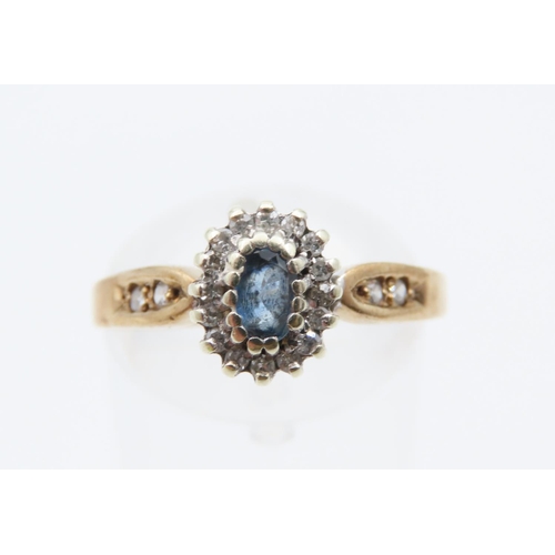 1084 - Aquamarine Centre Stone Cluster Ring Mounted on 9 Carat Yellow Gold Band Ring Size N