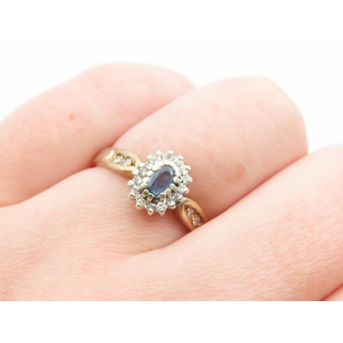 1084 - Aquamarine Centre Stone Cluster Ring Mounted on 9 Carat Yellow Gold Band Ring Size N