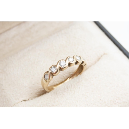 1089 - Seven Stone Ladies Diamond Ring Collet Set Mounted on 9 Carat Yellow Gold Band Ring Size L