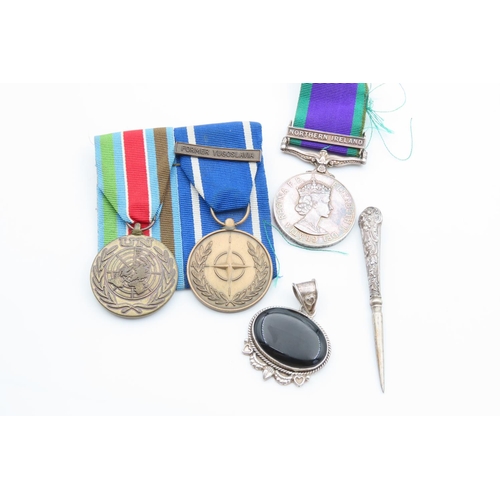 1094 - Three Various Medals with Silver Handled Nail Pick and Silver Mounted Panel Set Onyx Mounted Pendant... 