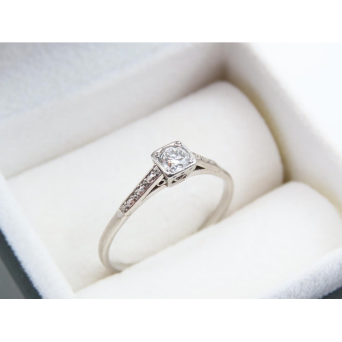 1107 - Diamond Solitaire Ring Set on Platinum Band Further Diamond Decorated Shoulders Ring Size P and a Ha... 