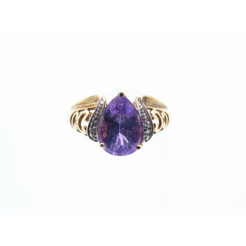 1109 - Amethyst and Diamond Centre Stone Ring Pear Cut Mounted on 9 Carat Yellow Gold Band Size N and a Hal... 