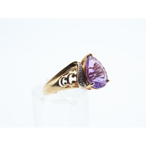 1109 - Amethyst and Diamond Centre Stone Ring Pear Cut Mounted on 9 Carat Yellow Gold Band Size N and a Hal... 