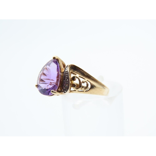 1109 - Amethyst and Diamond Centre Stone Ring Pear Cut Mounted on 9 Carat Yellow Gold Band Size N and a Hal... 