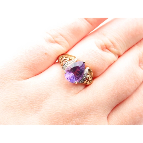 1109 - Amethyst and Diamond Centre Stone Ring Pear Cut Mounted on 9 Carat Yellow Gold Band Size N and a Hal... 