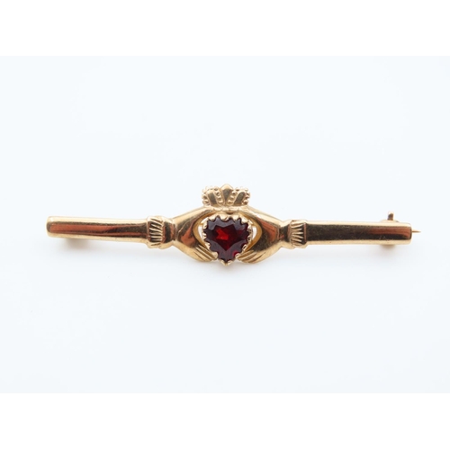 1115 - Garnet Set 9 Carat Yellow Gold Brooch Claddagh Motif 5cm Wide