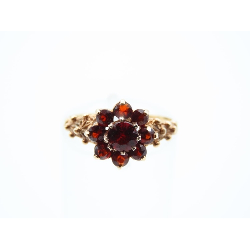 1122 - Garnet Cluster Ring Mounted on 9 Carat Yellow Gold Band Ring Size L