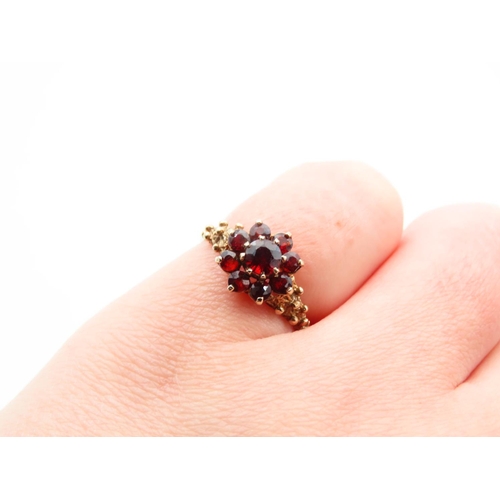 1122 - Garnet Cluster Ring Mounted on 9 Carat Yellow Gold Band Ring Size L