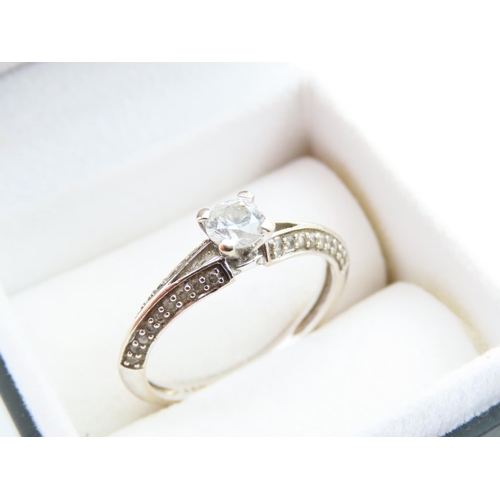 1125 - Diamond and Solitaire Ring Mounted on 18 Carat Yellow Gold Band Platinum Set Further Diamond Decorat... 