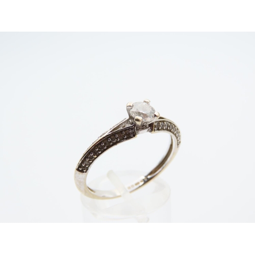 1125 - Diamond and Solitaire Ring Mounted on 18 Carat Yellow Gold Band Platinum Set Further Diamond Decorat... 