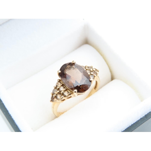 1126 - Smokey Quartz 9 Carat Yellow Gold Ring Size O and a Half