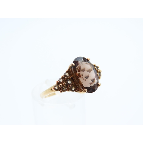 1126 - Smokey Quartz 9 Carat Yellow Gold Ring Size O and a Half