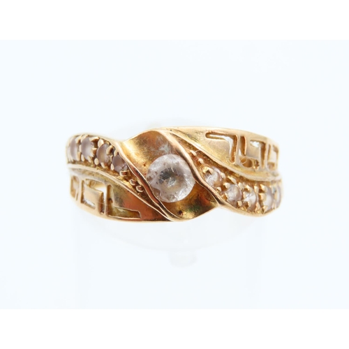 1127 - Diamond Centre Stone Ring Mounted on 18 Carat Yellow Gold Band with Further Diamond Decoration to Sh... 