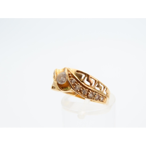 1127 - Diamond Centre Stone Ring Mounted on 18 Carat Yellow Gold Band with Further Diamond Decoration to Sh... 