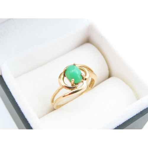 1142 - Polished Cabochon Cut Jade Center Stone Ring Mounted on 9 Carat Yellow Gold Band