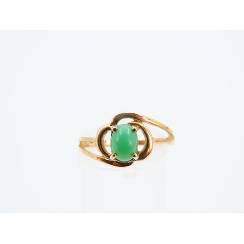 1142 - Polished Cabochon Cut Jade Center Stone Ring Mounted on 9 Carat Yellow Gold Band