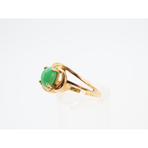 1142 - Polished Cabochon Cut Jade Center Stone Ring Mounted on 9 Carat Yellow Gold Band